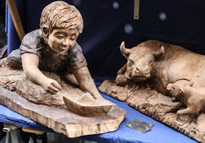 Wooden sculptures at the Sant'Orso Fair in Aosta