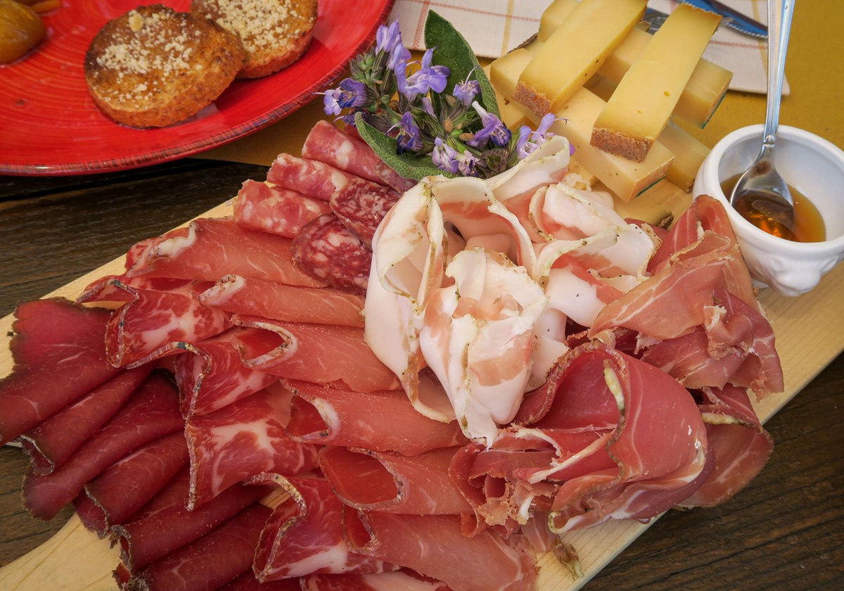 Platter of local cold cuts and cheeses typical of the Aosta Valley region